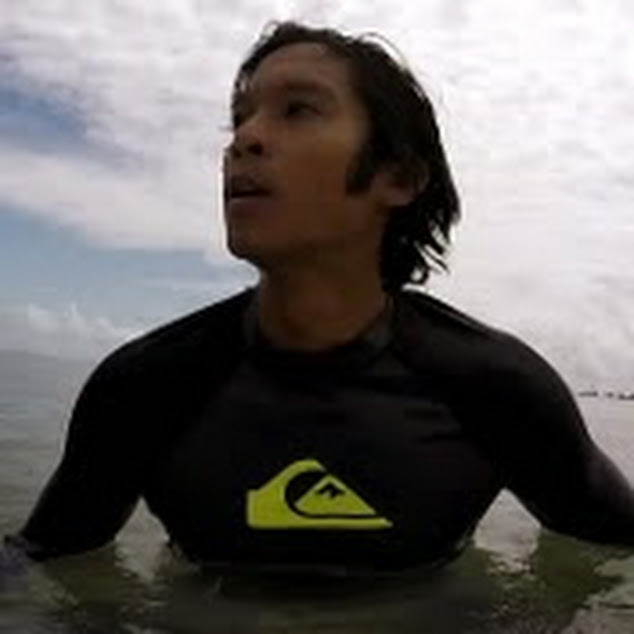 Joey chest-deep in the water at his home break