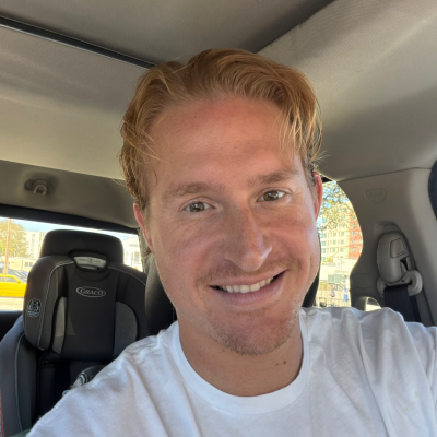 Keith smiling in the car