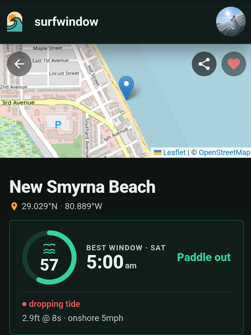 A SurfWindow spot page scoring New Smyrna Beach 57 with a 'Paddle out' call, best window Saturday 5:00am, on a dropping tide at 2.9ft @ 8s with 5mph onshore wind